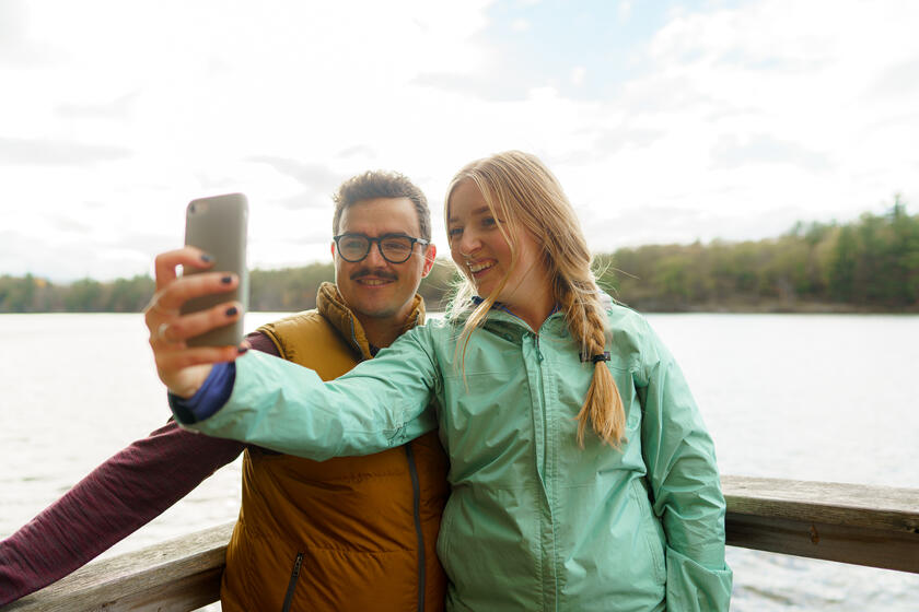 couple taking a selfie at a look out point